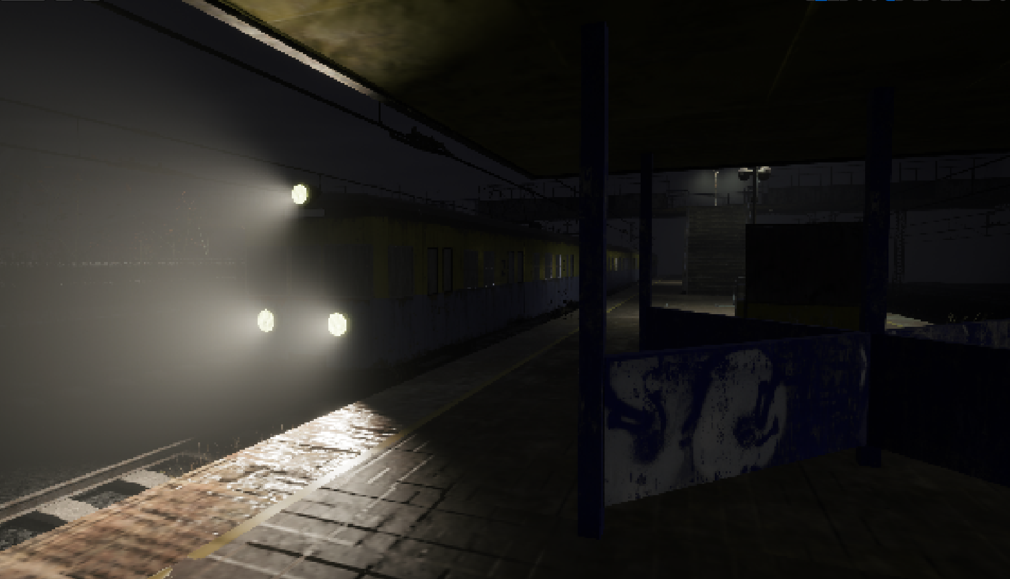 SKM train arriving at station at night